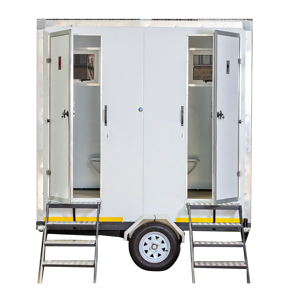 white two door mobile restroom