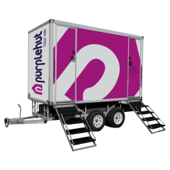 Purplehut branded VIP mobile restroom for portable toilet hire services